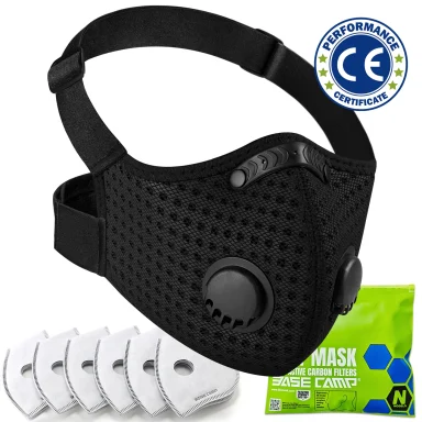 Black BASE CAMP N Pro dust mask with green filter detail.