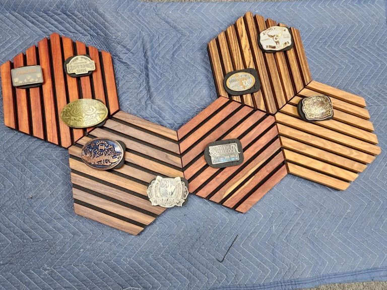 Geometric exotic wood acoustical panels for displaying belt buckles.