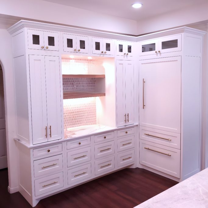 Full wall painted cabinetry wtih Alder inset doors and buil-in storage