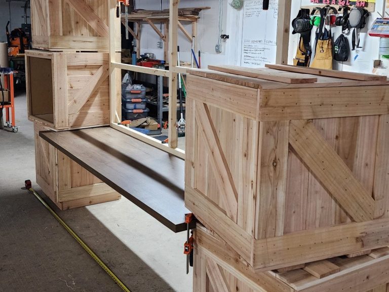 Spice Routes Scenic Build Wooden crate and counter structures assembled in the workshop.