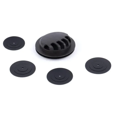 Black replacement valve components for BASE CAMP respirator masks.