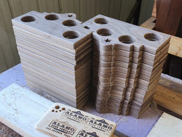 Stacked sanded walnut flight trays.